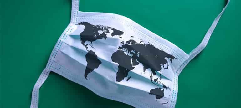 a surgical mask with a silhouette of a world map on it
